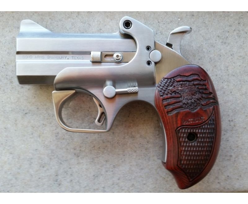 Bond-Arms-Patriot-Defender-BAPA45-410-855959006135.jpg_1.jpg Bond Arms Patriot Defender Derringer Stainless with Wood Grips 45LC/410 3-inch - Image 1